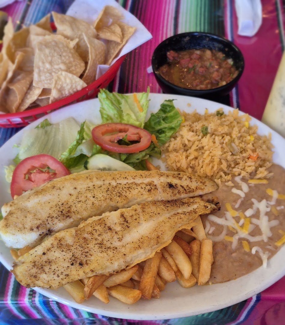 Seafood plates on a casual restaurant table.